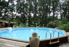 piscine hors sol avec terrasses bois ,6,5 m de diamètre ,1,40 m de profondeur